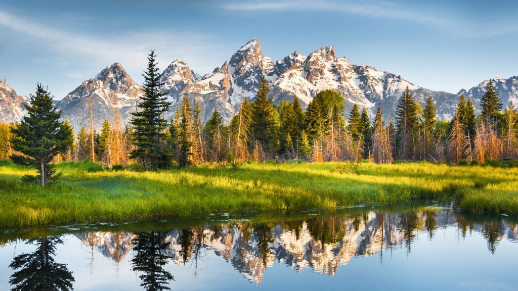 A mountain range with its reflection, Grand Teton National Park, Wyoming, USA