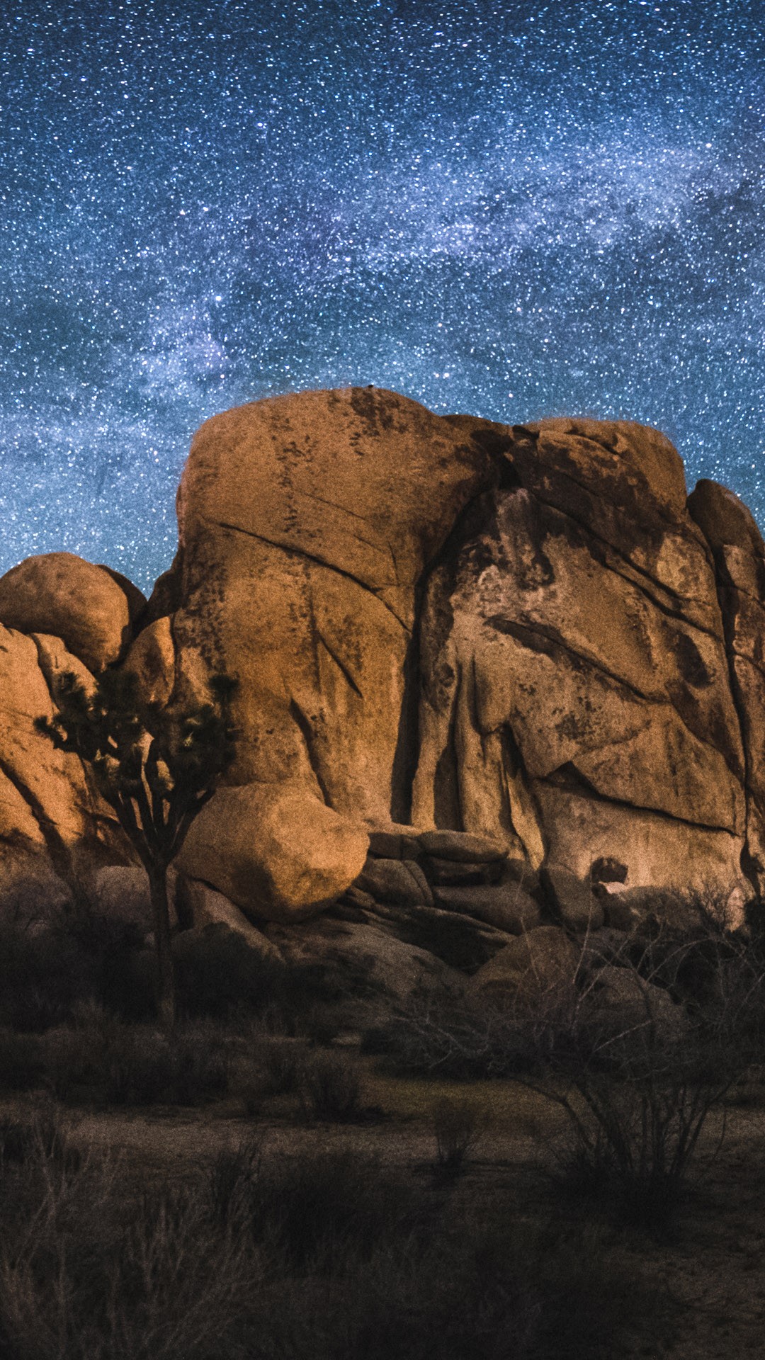 The Milky Way Arch Above Old Woman Rock In Joshua Tree National Park
