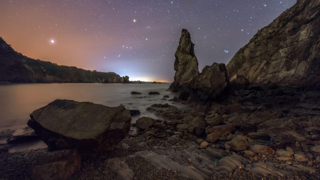 Night landscape of beach on the northern coast, Asturias, Spain