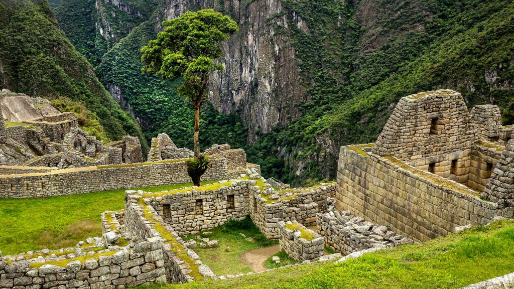 Overview of ruins at archaeological site, Machu Picchu, Cuzco Region, Peru
