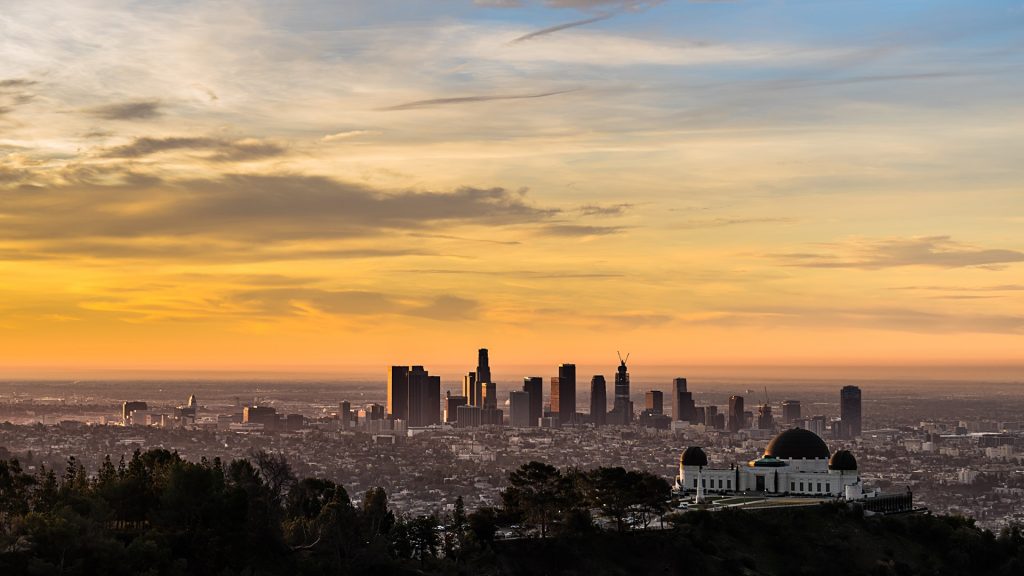 Downtown Los Angeles skyline and Griffith Park Observatory just after sunrise, California, USA