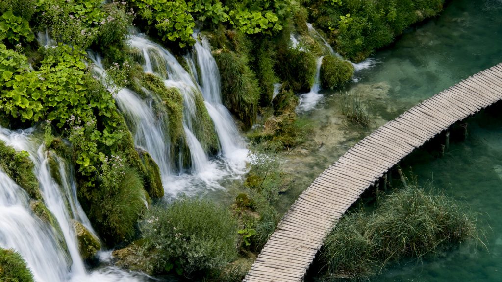 High angle view of waterfall and boardwalk at Plitvice Lakes National Park, Croatia