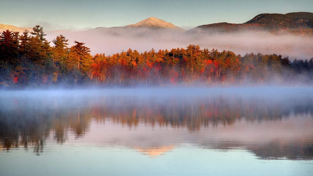 Autumn snow-capped mountains in the White Mountains National Forest, New Hampshire, USA