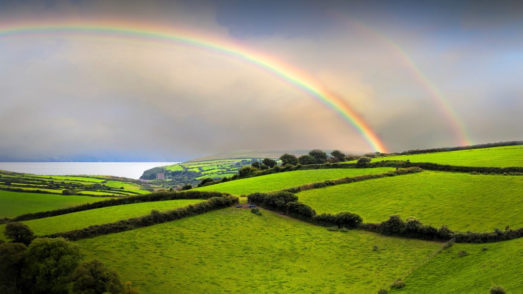 Double rainbow landscape in Dingle Peninsula scenery on sunny and rainy day, Ireland