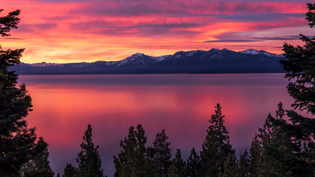 Fiery sunrise at Lake Tahoe in Sierra Nevada Mountains, California, USA