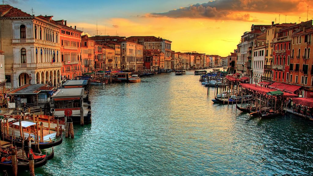 Looking down the Grand Canal on sunset from Rialto Bridge, Venice, Italy
