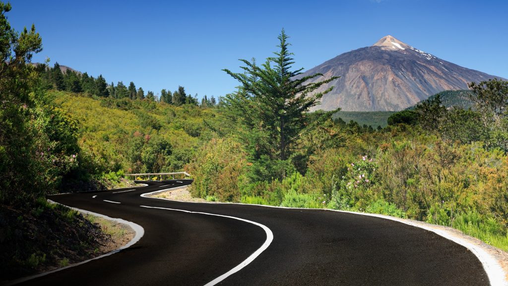 Mountain road in landscape on Tenerife Island showing the volcano Teide, Spain