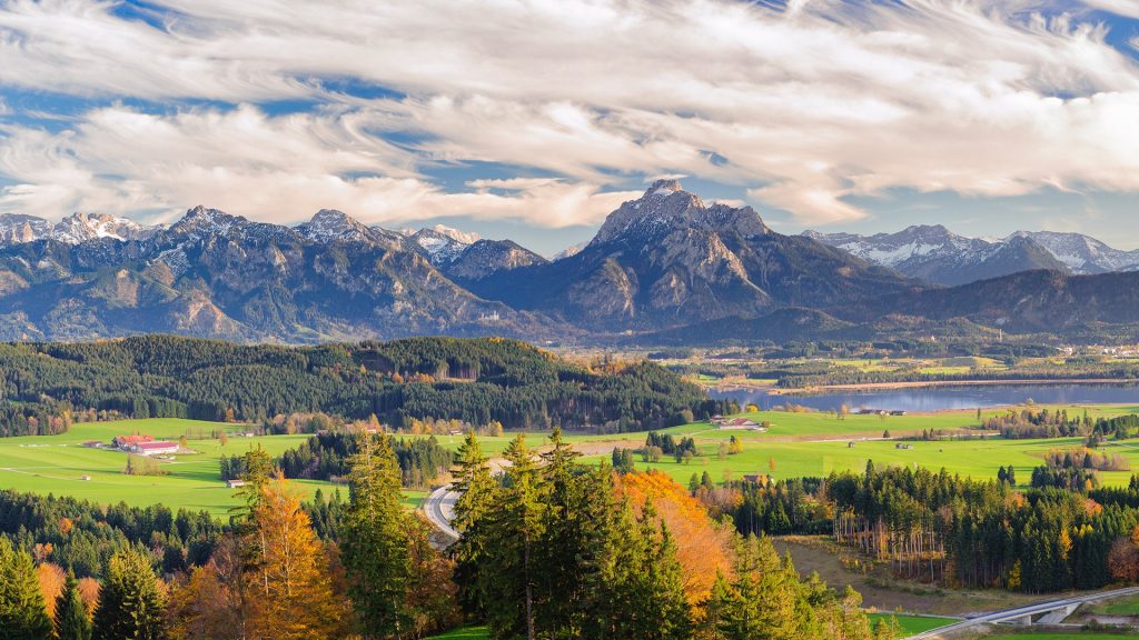 Panoramic landscape in Bavaria with Forggensee lake near Füssen and Allgäu Alps, Germany