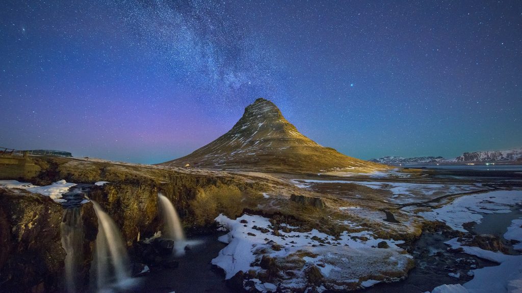 Kirkjufell landscape with Milky Way and aurora borealis, Iceland