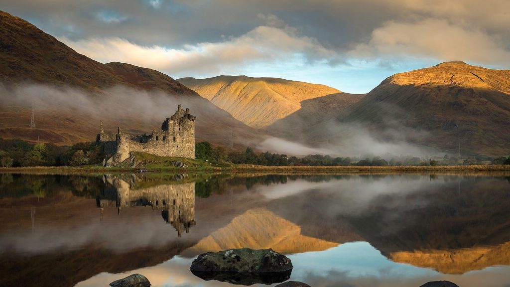 Kilchurn Castle in morning mist on Loch Awe in Argyll and Bute, Scotland, UK