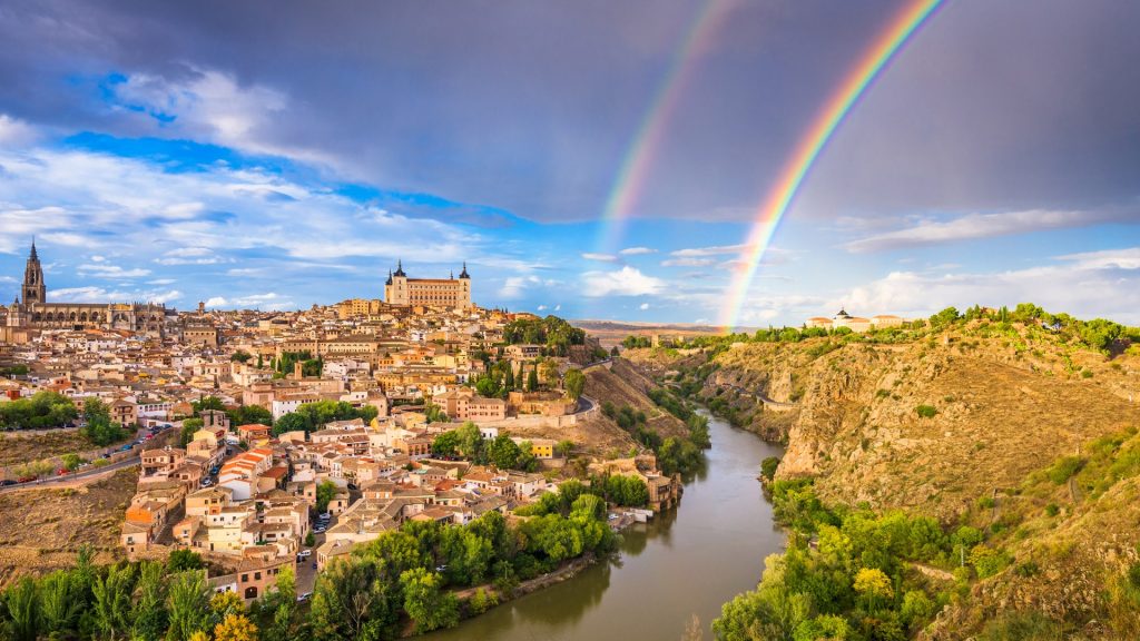 Old town skyline with a rainbow, Toledo, Spain
