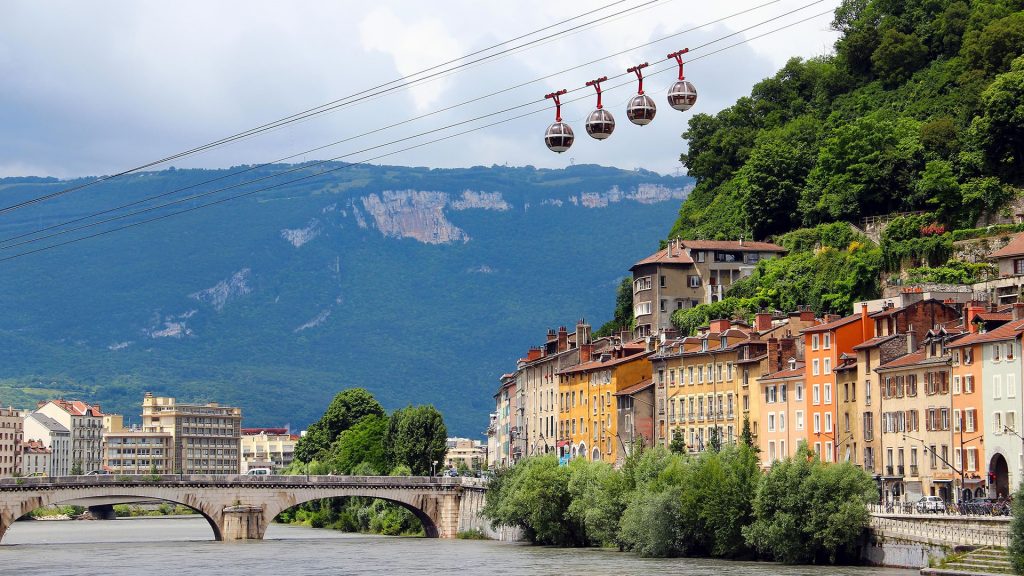 Isere river and cable car in the center of Grenoble, France