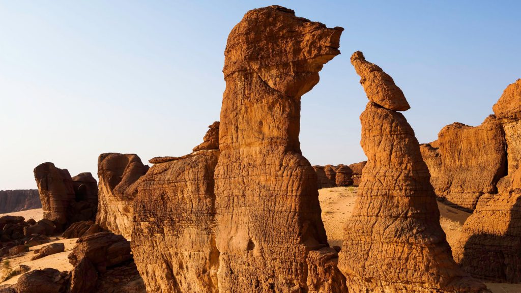 Dunes and sandstone monoliths, Archei sector, Ennedi massif, Southern Sahara desert, Chad