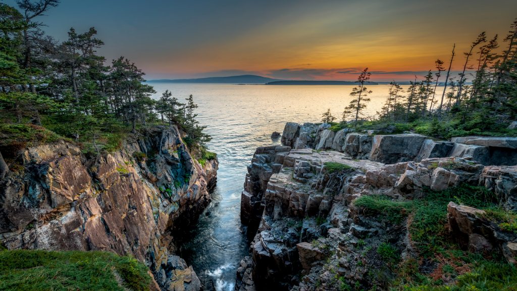 Sunset at Ravens Nest looking towards Acadia National Park and Cadillac Mountain, Maine, USA