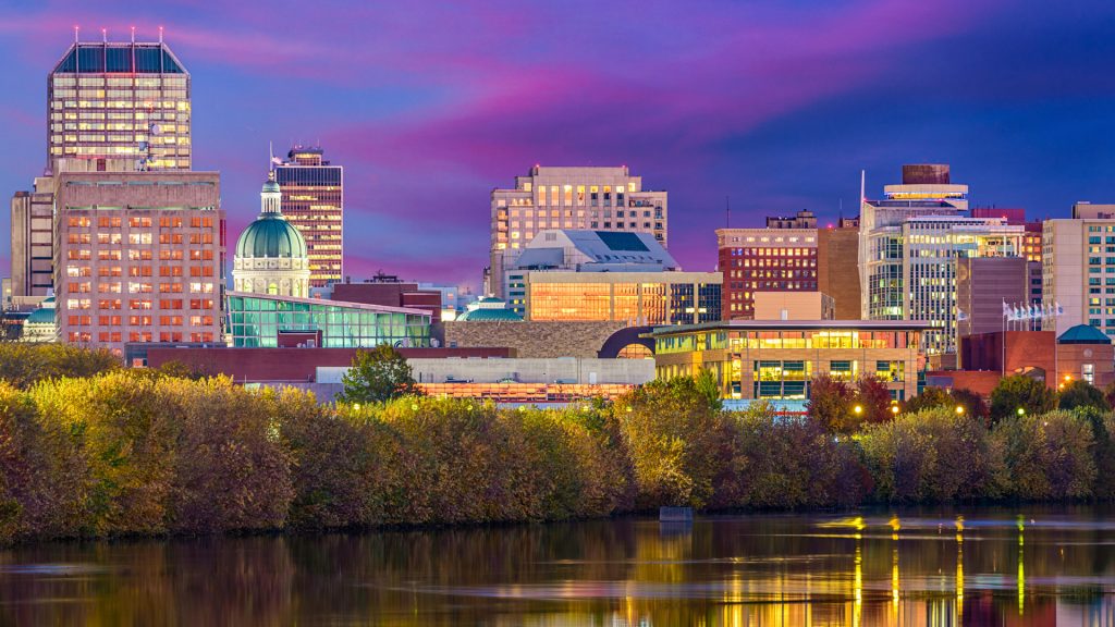 Skyline on the White River with the state capitol building at dusk, Indianapolis, Indiana, USA