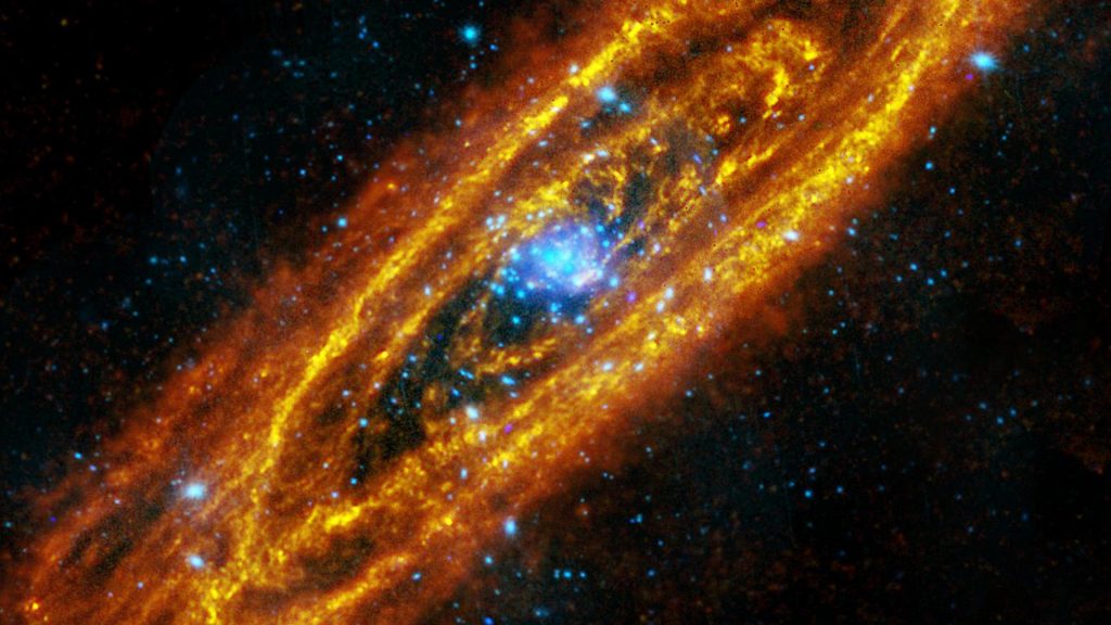 Andromeda galaxy composite photo of an infrared and X-ray telescopes