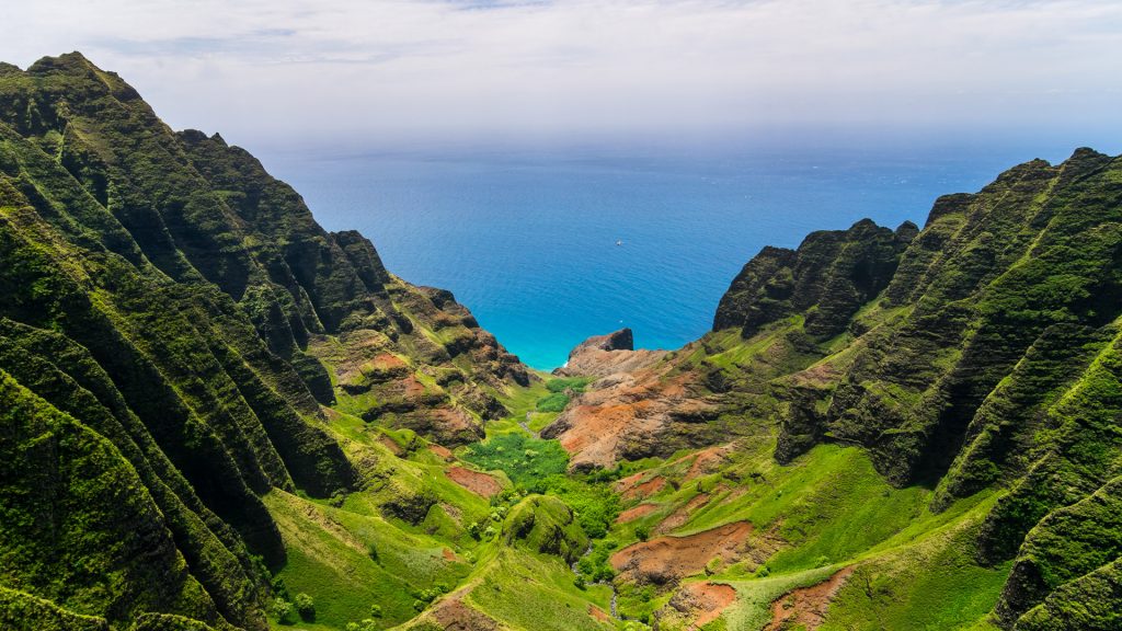 Aerial landscape view of cliffs and green valley, Kalalau Valley, Kauai, Hawaii, USA