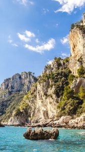 Rocky cliffs of Capri Island in the Tyrrhenian Sea, Campania, Italy 