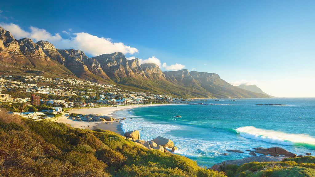 Beach and Twelve Apostles mountain in Camps Bay near Cape Town, South Africa
