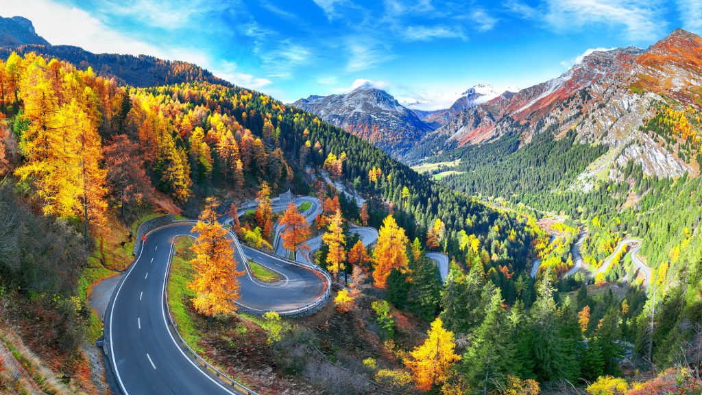 View of Maloja pass road, Swiss Alps in autumn, Engadine region, Grisons canton, Switzerland