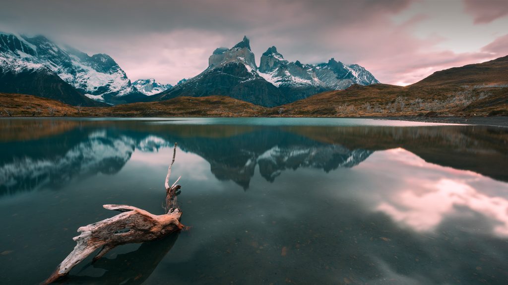 Reflection of mountains in the lake at sunset, National Park Torres del Paine, Chile