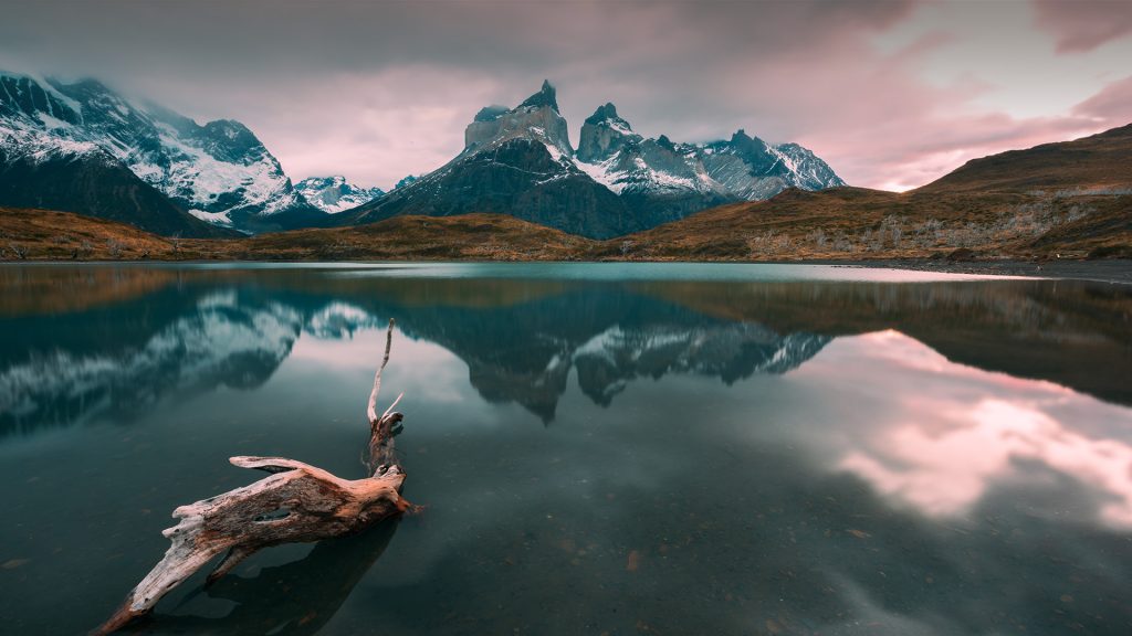 Reflection Of Mountains In The Lake At Sunset National Park Torres Del 