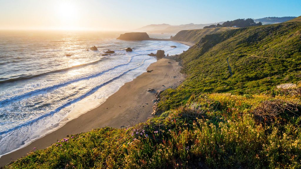 Sunset over Blind Beach and Goat Rock in the Sonoma Coast State Park, California, USA