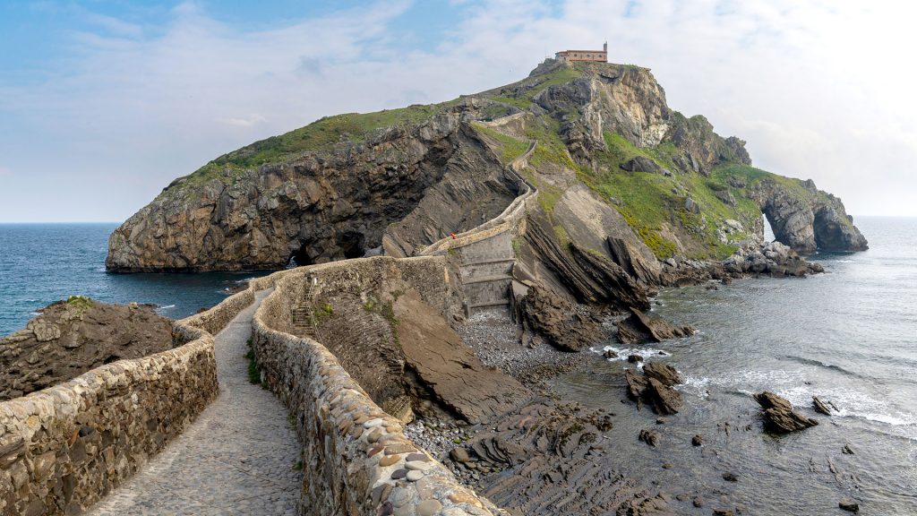 View of the church of San Juan de Gaztelugatxe and long stone stairs leading to it, Spain