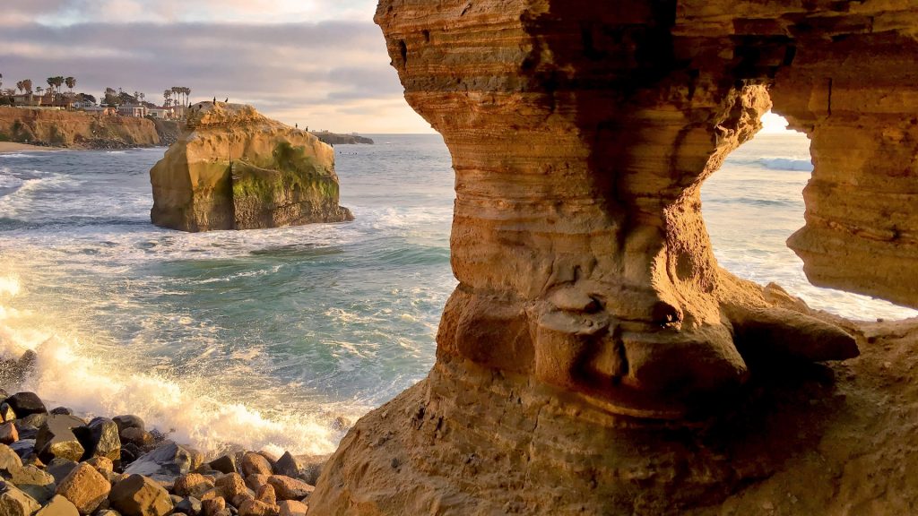 Natural rock formations along beach coastline, Sunset Cliffs, California, USA