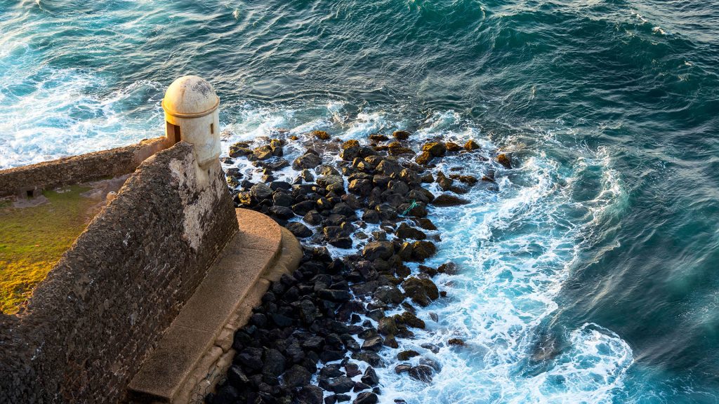 Waves crash against the base of Castillo San Felipe del Morro, San Juan, Puerto Rico