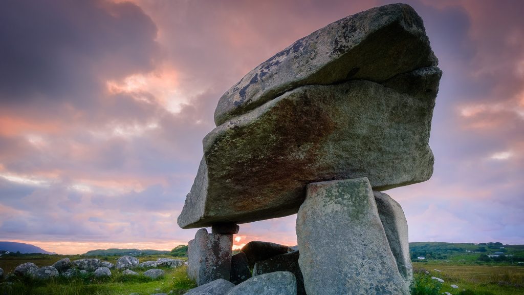Neolithic portal tomb Kilclooney More dolmen at sunset, County Donegal, Ireland