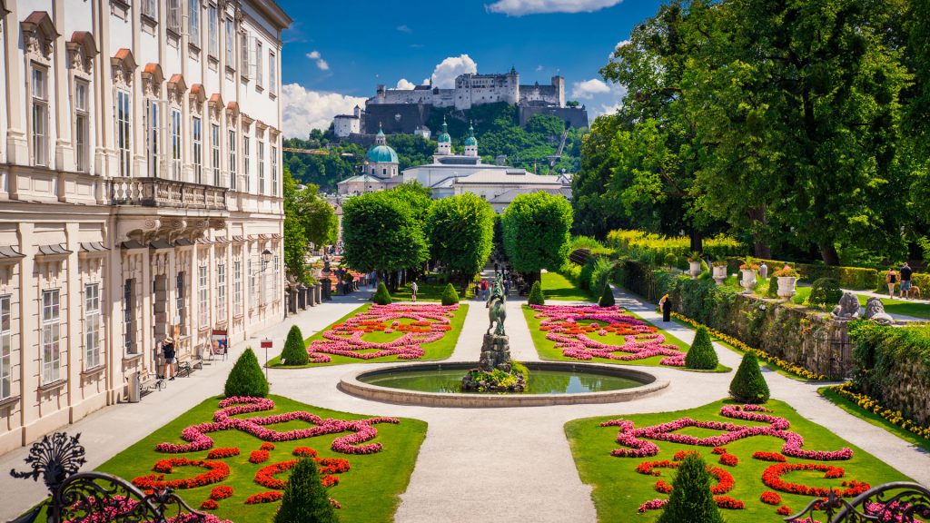 Mirabell Palace and Gardens in summer, Salzburg castle in background, Austria