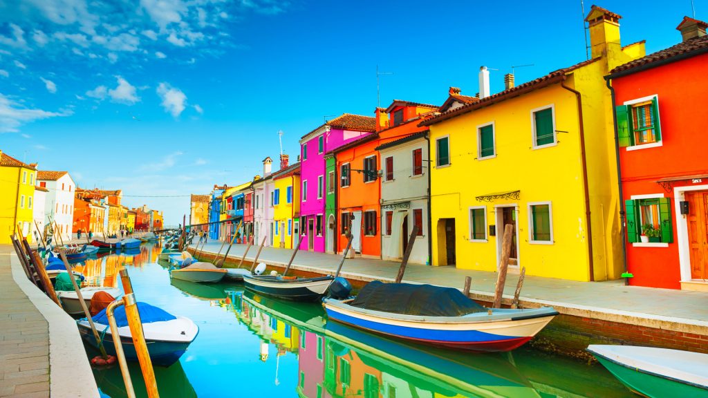 Colorful houses on the canal in Burano island, Venice, Italy