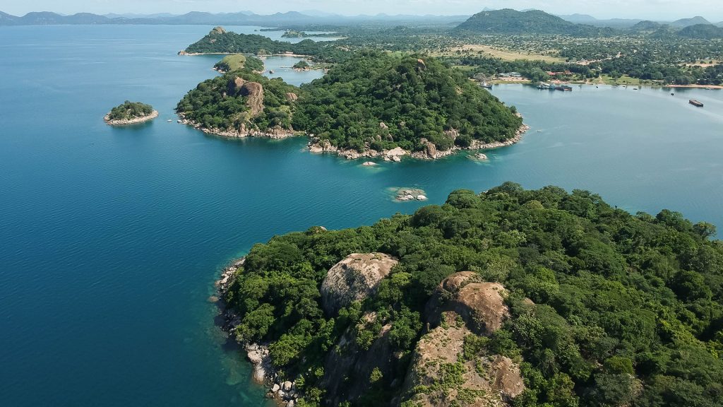 Landscape of lake with hills and islands under the sunlight, Lake Malawi, Malawi