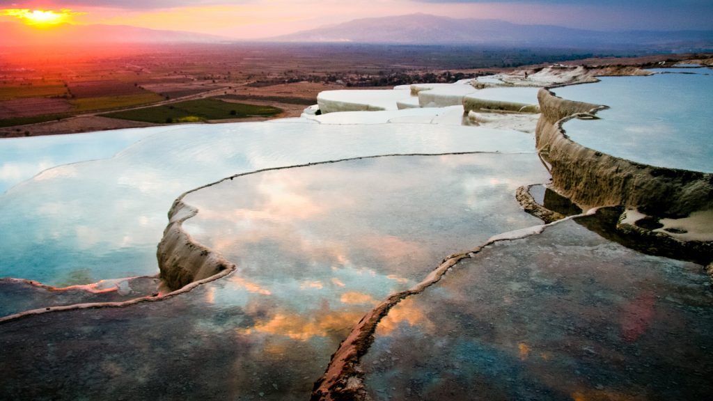 Layers of travertines form terraces of carbonate minerals, Pamukkale Pools, Denizli, Turkey