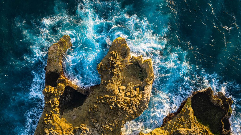 Overhead view of the famous Devil's tears coastline in Nusa Lembongan, Bali, Indonesia
