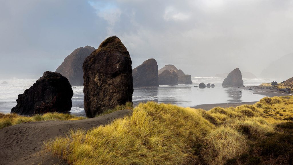 Panoramic view of rocks on beach against sky, Gold Beach, Oregon, USA