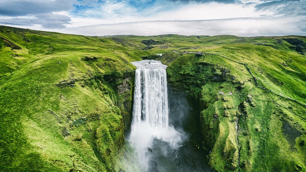 Aerial view of landscape around Skógafoss waterfall on Skógá River in south Iceland