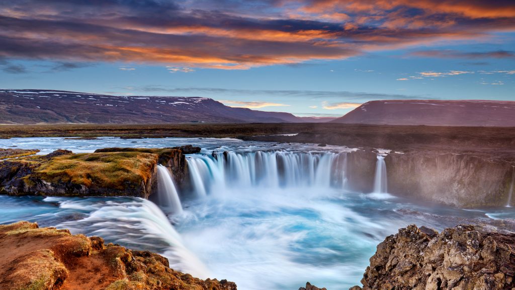 Panorama view of Goðafoss waterfall near Akureyri in the highlands of Iceland at sunset