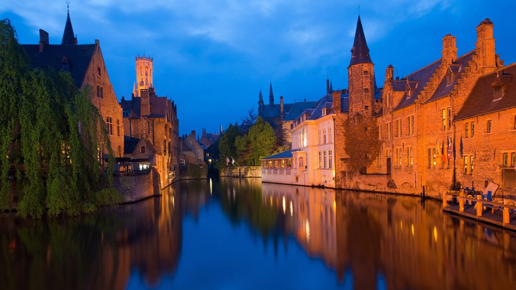 Architecture reflected in canal in front of RozenhoedKaai in the old city of Brugge, Belgium