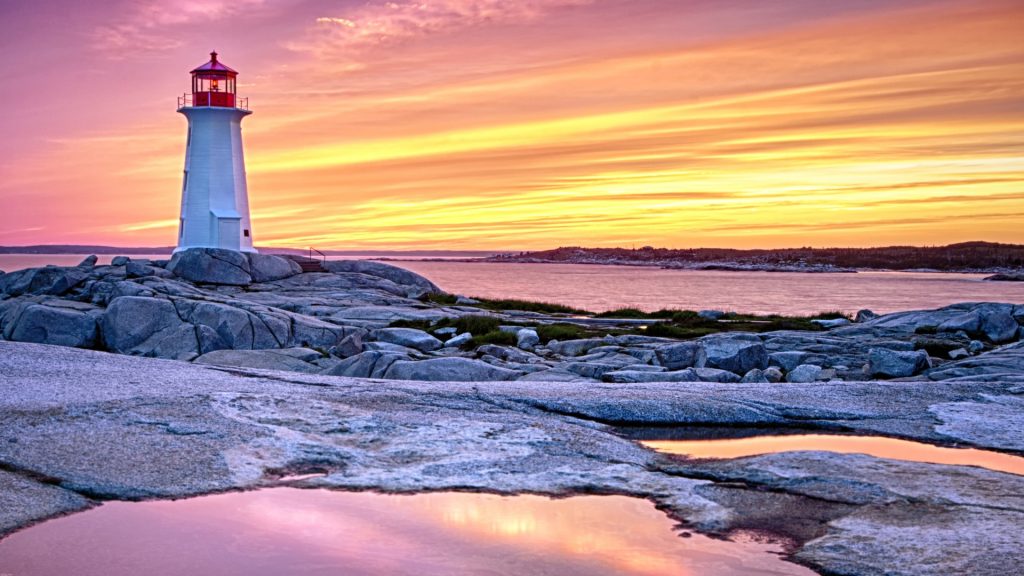 A nice dusk light show at Peggys Point Lighthouse, Peggy's Cove, Nova Scotia, Canada