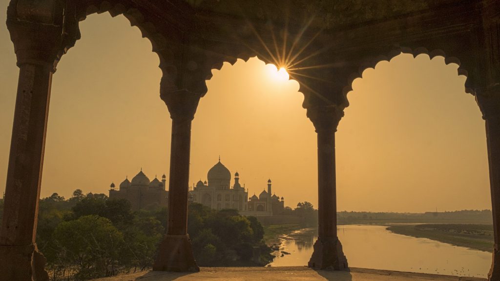 Sunset over Taj Mahal and Yamuna River view from the pavilion, Agra, India