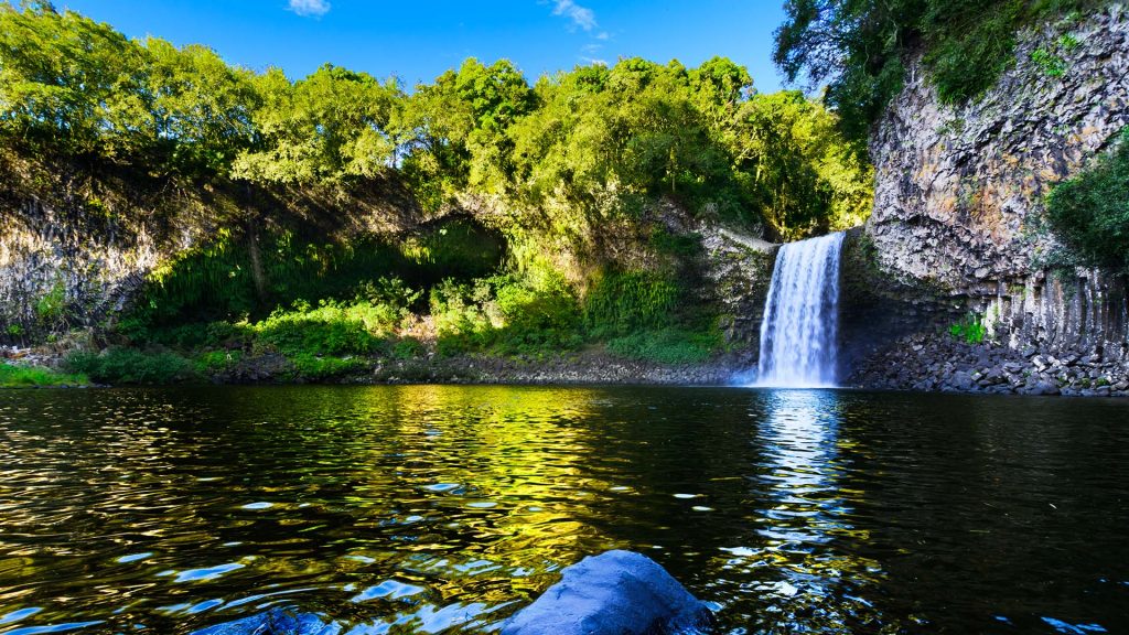 Waterfall of Bassin La Paix at Reunion Island during a sunny day, France