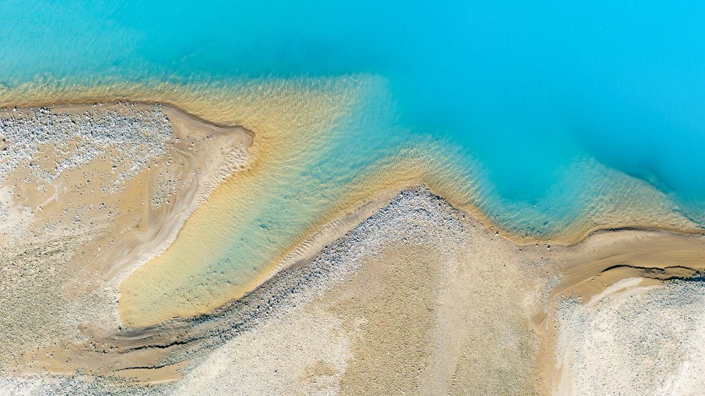 Clear azure water in a mountain lake, Alberta, Canada