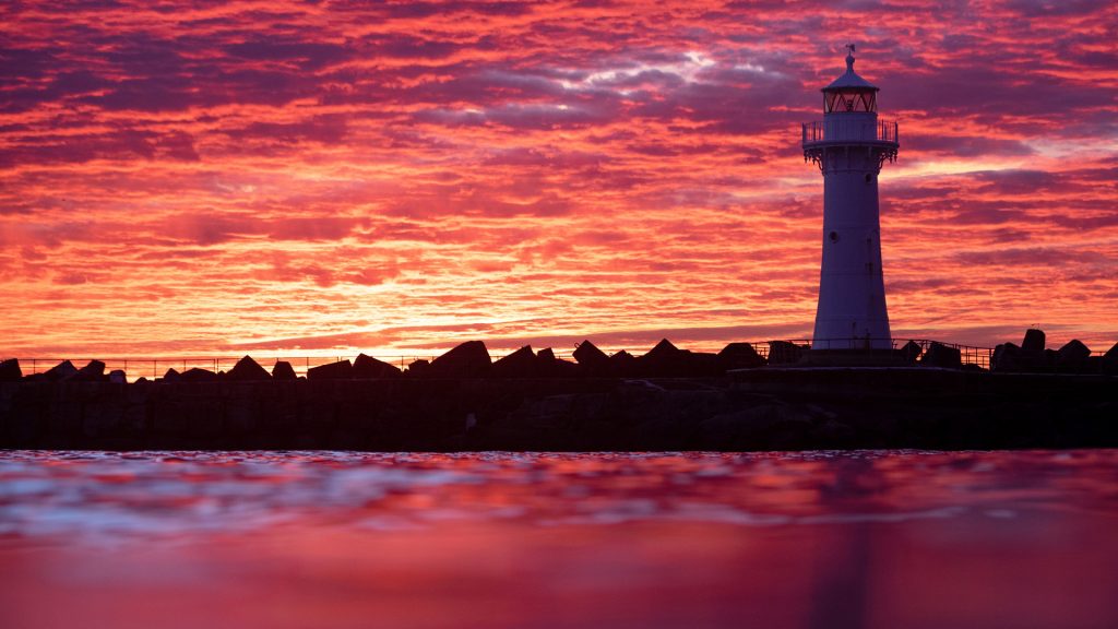 Wollongong Breakwater or Harbour Lighthouse at sunrise, New South Wales, Australia