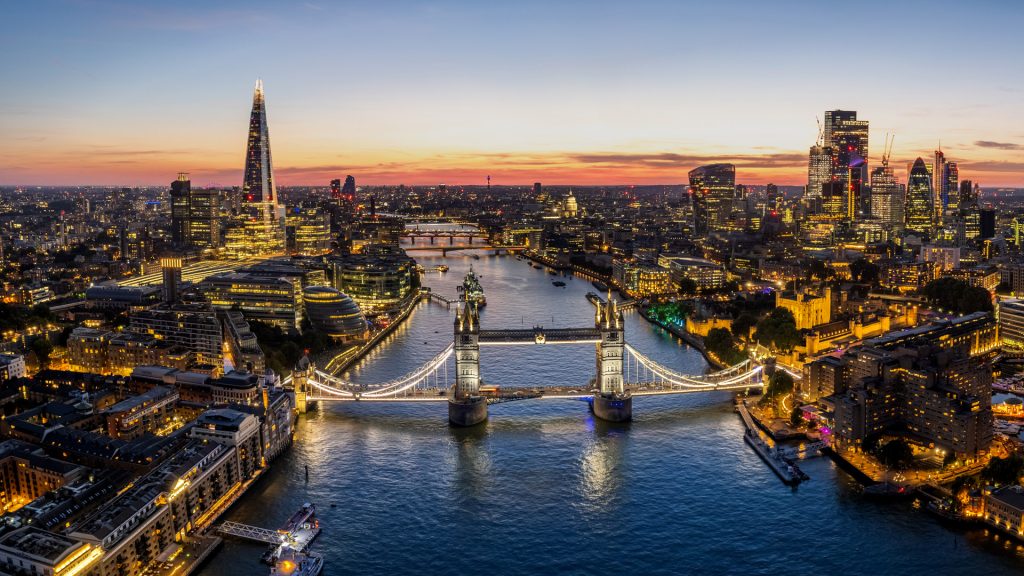 Panoramic view of river Thames and London Tower Bridge at twilight in blue hour, England, UK