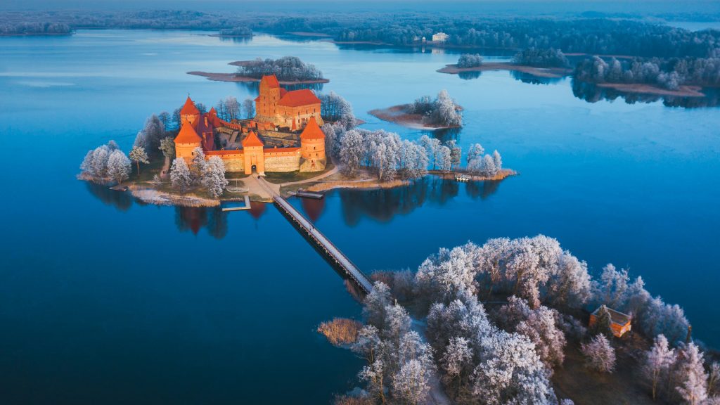 Trakai castle on lake Galvė aerial view in winter at sunrise, Lithuania