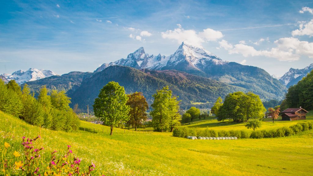 Alpine mountain scenery with meadows and peaks on a sunny day in springtime, Bavaria, Germany