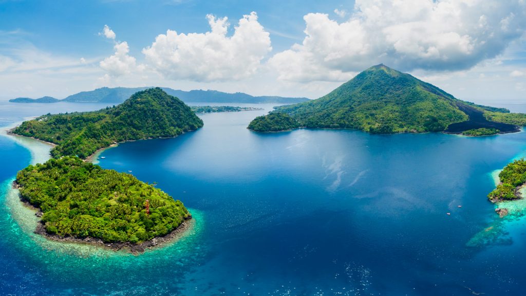 Aerial view of Banda Islands in Moluccas archipelago with Pulau Gunung Api, Indonesia