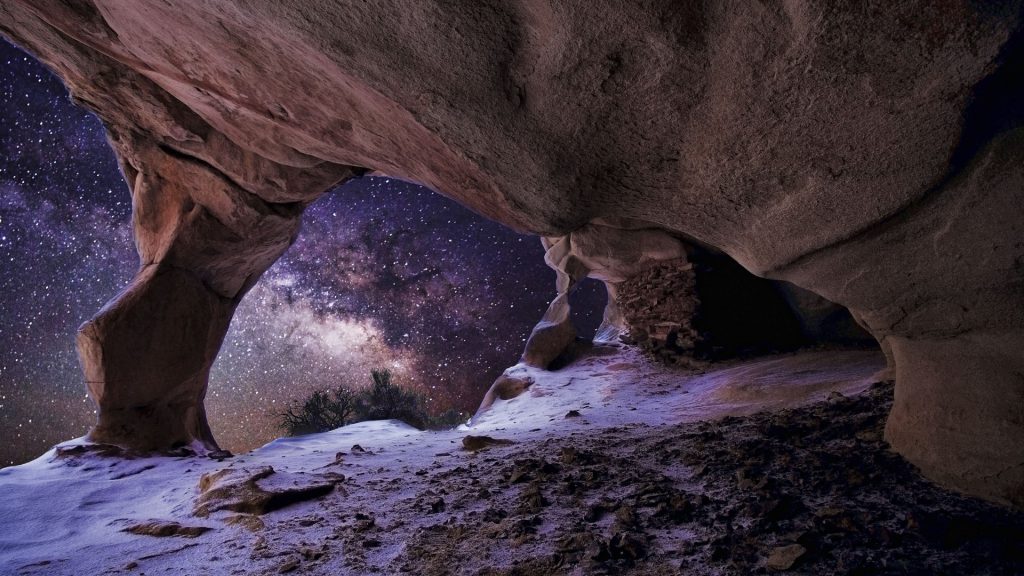 Ancient pueblan pranary under the Milky Way in a cave, Canyonlands National Park, Utah, USA